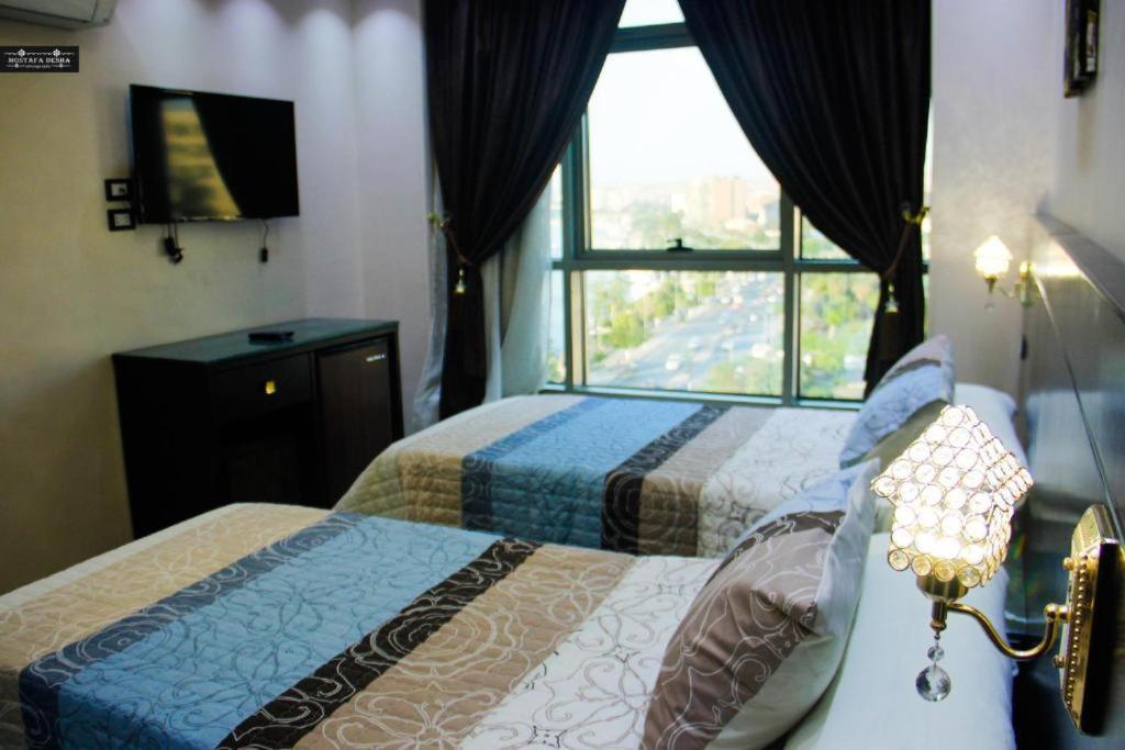 Aswan Plaza - Share Apartment Exteriör bild